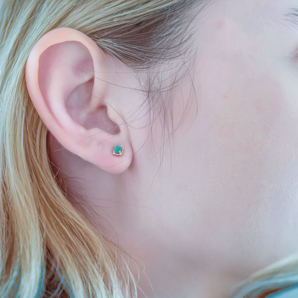 Charismatic Gold Emerald Stud Earrings